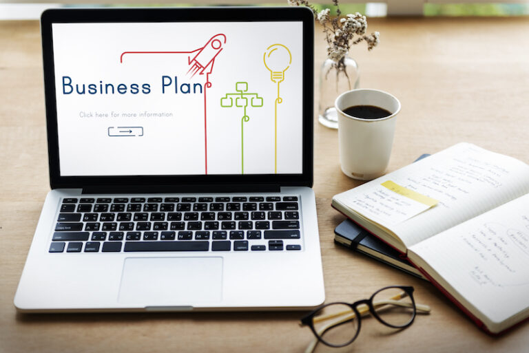 Dator med texten business plan
